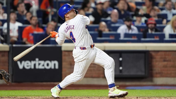 New York Mets catcher Francisco Alvarez (4) hits a walk-off game-winning home run against the Baltimore Orioles during the ninth inning at Citi Field.