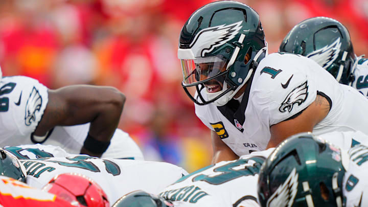 Sep 14, 2025; Kansas City, Missouri, USA; Philadelphia Eagles quarterback Jalen Hurts (1) calls a play at the line of scrimmage against the Kansas City Chiefs during the fourth quarter of the game at GEHA Field at Arrowhead Stadium.