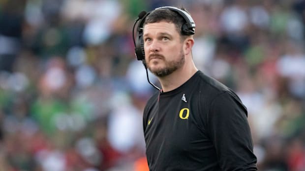 Oregon head coach Dan Lanning looks to the clock towards the end of the first half as the Oregon Ducks face the Ohio State Bu