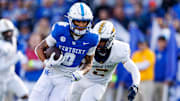 Kentucky Wildcats wide receiver Dane Key runs the ball against the Murray State Racers at Kroger Field.