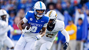 Kentucky Wildcats wide receiver Dane Key runs the ball against the Murray State Racers at Kroger Field.