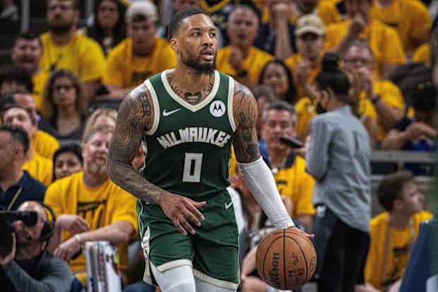 Milwaukee Bucks guard Damian Lillard (0) dribbles the ball against the Indiana Pacers during the 2024 NBA playoffs.