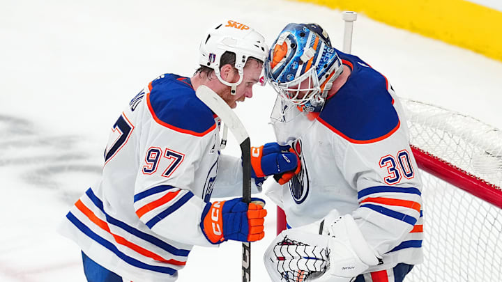 May 6, 2025; Las Vegas, Nevada, USA; Edmonton Oilers center Connor McDavid (97) congratulates goaltender Calvin Pickard (30) after defeating the Vegas Golden Knights 4-2 in game one of the second round of the 2025 Stanley Cup Playoffs at T-Mobile Arena. Mandatory Credit: Stephen R. Sylvanie-Imagn Images