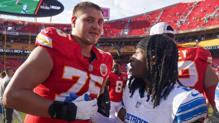 Aug 17, 2024; Kansas City, Missouri, USA; Kansas City Chiefs offensive tackle Ethan Driskell (75) and Detroit Lions cornerback Steven Gilmore (24) shake hands after the game the game at GEHA Field at Arrowhead Stadium. Mandatory Credit: Denny Medley-USA TODAY Sports