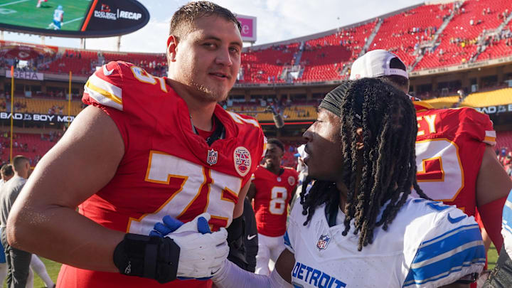 Aug 17, 2024; Kansas City, Missouri, USA; Kansas City Chiefs offensive tackle Ethan Driskell (75) and Detroit Lions cornerback Steven Gilmore (24) shake hands after the game the game at GEHA Field at Arrowhead Stadium. Mandatory Credit: Denny Medley-Imagn Images