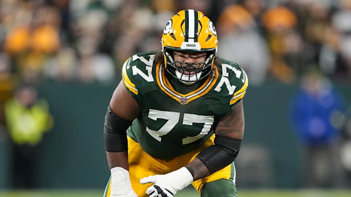 Nov 10, 2025; Green Bay, Wisconsin, USA;  Green Bay Packers offensive tackle Jordan Morgan (77) during the game against the Philadelphia Eagles at Lambeau Field. Mandatory Credit: Jeff Hanisch-Imagn Images