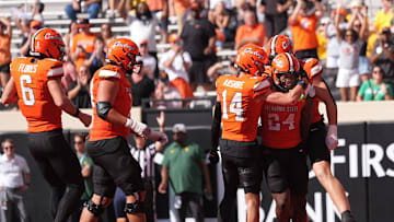 Oklahoma State celebrates a Trent Howland (24) touchdown in the first half of the college football game between the Oklahoma State Cowboys and the Baylor Bears at Boone Pickens Stadium in Stillwater, Okla., Saturday, Sept. 27, 2025.
