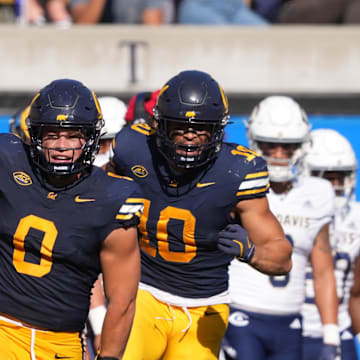 Cal linebacker Cade Uluave (0) celebrates