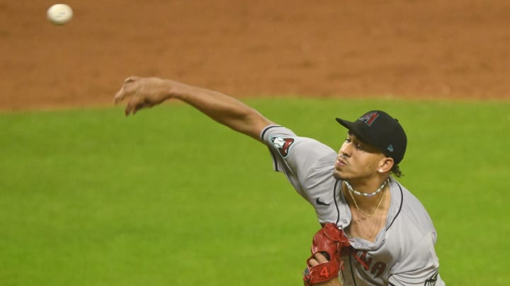 Aug 5, 2024; Cleveland, Ohio, USA; Arizona Diamondbacks relief pitcher Justin Martinez (63) delivers a pitch in the tenth inning against the Cleveland Guardians at Progressive Field. Mandatory Credit: David Richard-USA TODAY Sports