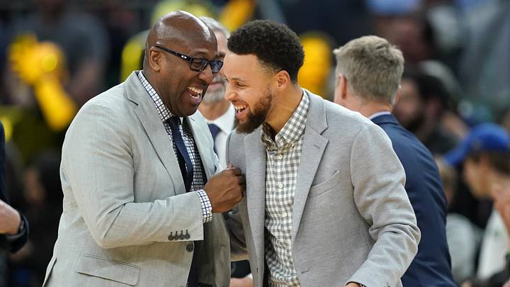 Jan 18, 2020; San Francisco, California, USA; Golden State Warriors assistant coach Mike Brown and guard Stephen Curry (30) share a laugh during the fourth quarter against the Orlando Magic at Chase Center. Mandatory Credit: Darren Yamashita-Imagn Images