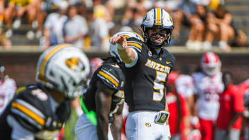 Sept 13, 2025; Columbia, Missouri, USA; Missouri Tigers back up quarterback Matt Zollers point out wide in the third quarter at Faurot Field.