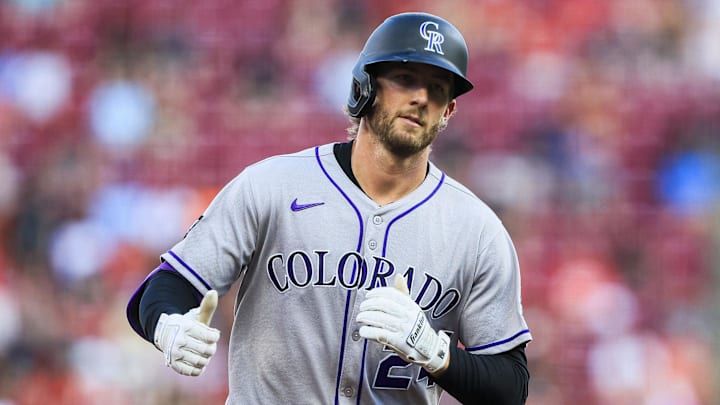 Rockies third baseman Ryan McMahon runs the bases after hitting a home run.