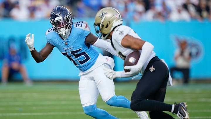 Tennessee Titans cornerback Kaiir Elam (35) chases down New Orleans Saints wide receiver Chris Olave (12) after a catch and run during the second quarter at Nissan Stadium in Nashville, Tenn., Sunday, Dec. 28, 2025.