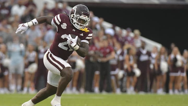 Davon Booth’s volume comes with limits in a split backfield, and against a sturdier ASU front his under is the sharper angle.