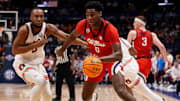 Mississippi forward Malik Dia (0) pushes past Auburn forward Chris Moore (5) during the first half of a Southeastern Conference tournament quarterfinal game at Bridgestone Arena in Nashville, Tenn., Friday, March 14, 2025.