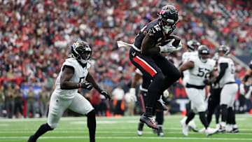 Nico Collins hauls in one of his 7 receptions in a 36-29 win over the Jacksonville Jaguars last Sunday