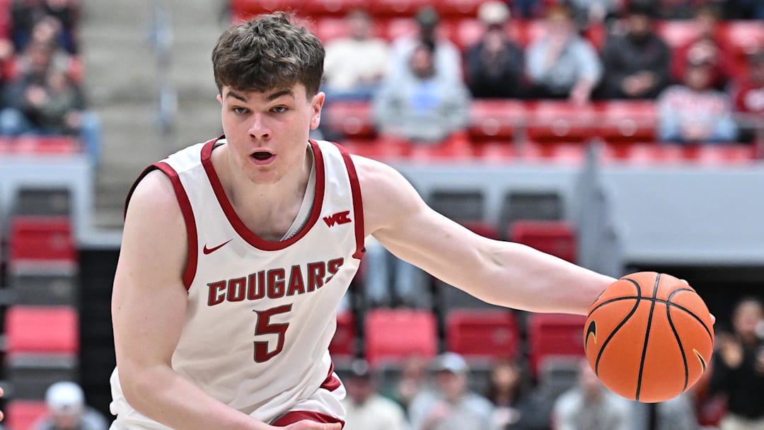 Washington State Cougars guard Tomas Thrastarson (5) dribbles against the San Francisco Dons at Friel Court at Beasley Coliseum. 