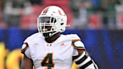Nov 1, 2025; Dallas, Texas, USA;  SMU Miami Hurricanes defensive lineman Rueben Bain Jr. (4) warms up before the game against the SMU Mustangs at Gerald J. Ford Stadium. Mandatory Credit: Jerome Miron-Imagn Images