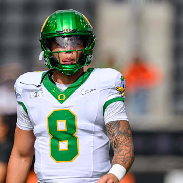 Sep 14, 2024; Corvallis, Oregon, USA; Oregon Ducks quarterback Dillon Gabriel (8) warms up prior to the game against the Oregon State Beavers at Reser Stadium. Mandatory Credit: Craig Strobeck-Imagn Images