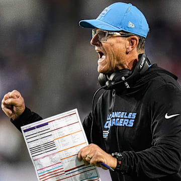 LA Chargers head coach Jim Harbaugh celebrates a touchdown against Detroit Lions 