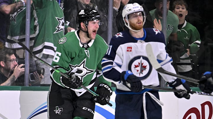 May 11, 2025; Dallas, Texas, USA; Dallas Stars right wing Mikko Rantanen (96) celebrates scoring a goal as Winnipeg Jets left wing Kyle Connor (81) looks on during the third period in game three of the second round of the 2025 Stanley Cup Playoffs at American Airlines Center. Mandatory Credit: Jerome Miron-Imagn Images