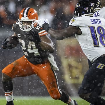 Dec 17, 2022; Cleveland, Ohio, USA; Cleveland Browns running back Nick Chubb (24) runs the ball against the Baltimore Ravens during the fourth quarter at FirstEnergy Stadium. Mandatory Credit: Scott Galvin-USA TODAY Sports