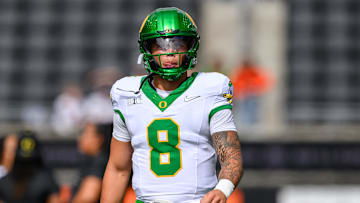 Sep 14, 2024; Corvallis, Oregon, USA; Oregon Ducks quarterback Dillon Gabriel (8) warms up prior to the game against the Oregon State Beavers at Reser Stadium. Mandatory Credit: Craig Strobeck-Imagn Images