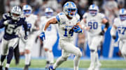 Detroit Lions wide receiver Amon-Ra St. Brown (14) runs against Dallas Cowboys during the second half at Ford Field in Detroit on Thursday, Dec. 4, 2025.
