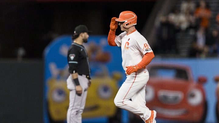 Sep 3, 2024; San Francisco, California, USA;  San Francisco Giants third baseman Matt Chapman (26) gestures as he runs the bases after hitting a solo home run against the Arizona Diamondbacks during the sixth inning at Oracle Park. 