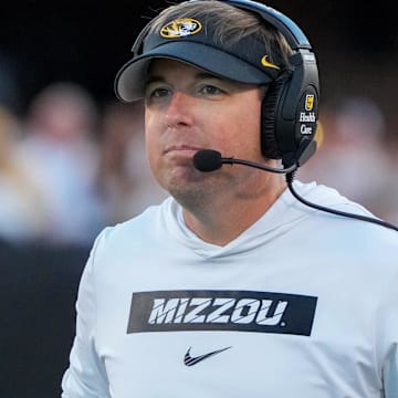 Sep 7, 2024; Columbia, Missouri, USA; Missouri Tigers head coach Eli Drinkwitz watches play against the Buffalo Bulls during the first half at Faurot Field at Memorial Stadium. Mandatory Credit: Denny Medley-Imagn Images