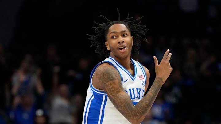 Mar 13, 2025; Charlotte, NC, USA; Duke basketball guard Isaiah Evans (3) reacts after hitting a three point shot in the first half at Spectrum Center.