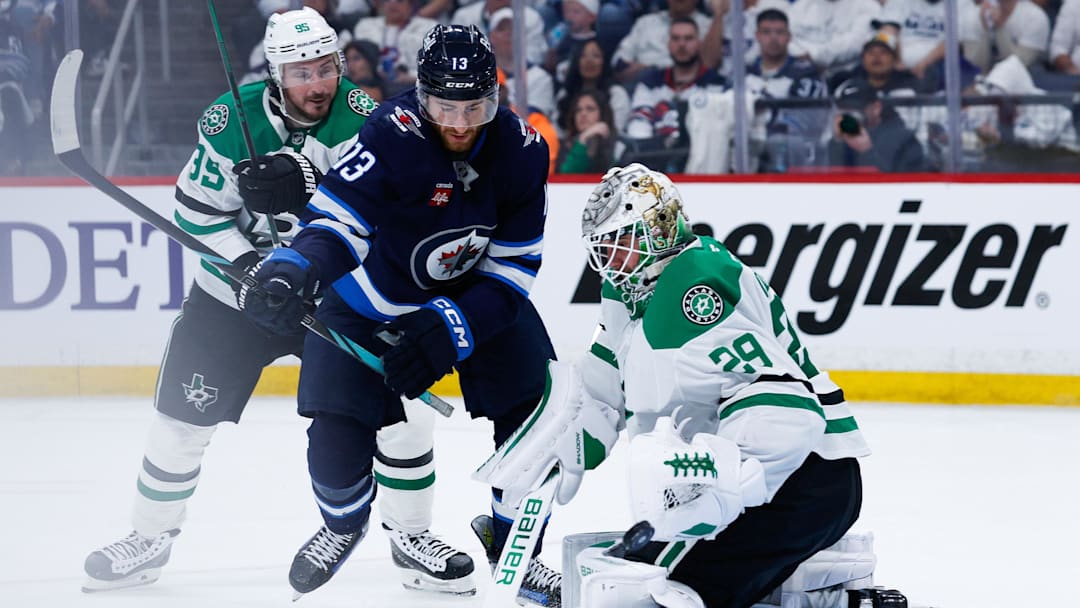May 15, 2025; Winnipeg, Manitoba, CAN; Dallas Stars goalie Jake Oettinger (29) makes a save as Winnipeg Jets forward Gabriel Vilardi (13) looks for a rebound during the second period in game five of the second round of the 2025 Stanley Cup Playoffs at Canada Life Centre. Mandatory Credit: Terrence Lee-Imagn Images