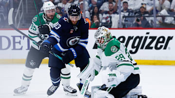 May 15, 2025; Winnipeg, Manitoba, CAN; Dallas Stars goalie Jake Oettinger (29) makes a save as Winnipeg Jets forward Gabriel Vilardi (13) looks for a rebound during the second period in game five of the second round of the 2025 Stanley Cup Playoffs at Canada Life Centre. Mandatory Credit: Terrence Lee-Imagn Images