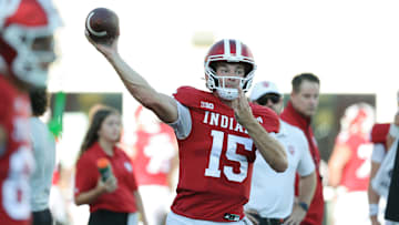 Sep 12, 2025; Bloomington, Indiana, USA; Indiana Hoosiers quarterback Fernando Mendoza (15) throws a pass prior to the game against the Indiana State Sycamores at Memorial Stadium. Mandatory Credit: Robert Goddin-Imagn Images