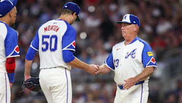 Aug 24, 2024; Atlanta, Georgia, USA; Atlanta Braves manager Brian Snitker (43) removes starting pitcher Charlie Morton (50) from a game against the Washington Nationals in the sixth inning at Truist Park. Mandatory Credit: Brett Davis-Imagn Images
