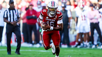 Oct 25, 2025; Columbia, South Carolina, USA; South Carolina Gamecocks quarterback Lanorris Sellers (16) scrambles against the Alabama Crimson Tide in the second quarter at Williams-Brice Stadium. Mandatory Credit: Jeff Blake-Imagn Images