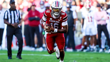Oct 25, 2025; Columbia, South Carolina, USA; South Carolina Gamecocks quarterback Lanorris Sellers (16) scrambles against the Alabama Crimson Tide in the second quarter at Williams-Brice Stadium. Mandatory Credit: Jeff Blake-Imagn Images