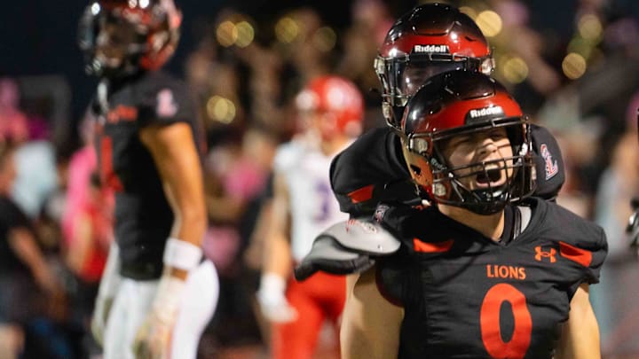 Sep 13, 2024; Peoria, Ariz., United States; Liberty Lions Running back Dominic Lombardo (9) celebrates a touchdown against the Mountain View Toros at Liberty High School in Peoria on Sept. 13, 2024.