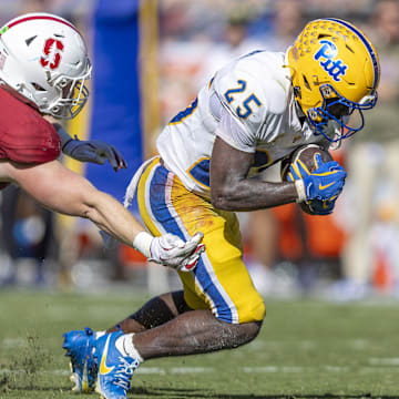 Nov 1, 2025; Stanford, California, USA; Pittsburgh Panthers running back Ja'Kyrian Turner (25) runs the ball during the second quarter at Stanford Stadium. Mandatory Credit: John Hefti-Imagn Images