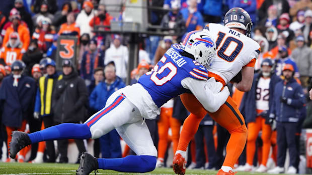 Jan 12, 2025; Orchard Park, New York, USA; Buffalo Bills defensive end Greg Rousseau (50) sacks Denver Broncos quarterback Bo