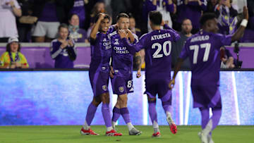Feb 22, 2025; Orlando, Florida, USA; Orlando City forward Marco Pasalic (87) celebrates with teammates after scoring a goal against the Philadelphia Union in the first half at Inter&Co Stadium. Mandatory Credit: Morgan Tencza-Imagn Images