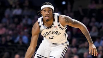 Mar 4, 2025; Nashville, Tennessee, USA;  Vanderbilt Commodores guard MJ Collins Jr. (2) drives to the basket against the Arkansas Razorbacks during the first half at Memorial Gymnasium. Mandatory Credit: Steve Roberts-Imagn Images