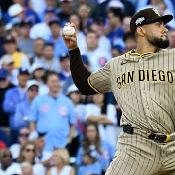 Oct 1, 2025; Chicago, Illinois, USA; San Diego Padres pitcher Robert Suarez (75) delivers during game two of the Wildcard round for the 2025 MLB playoffs at Wrigley Field. Mandatory Credit: Matt Marton-Imagn Images