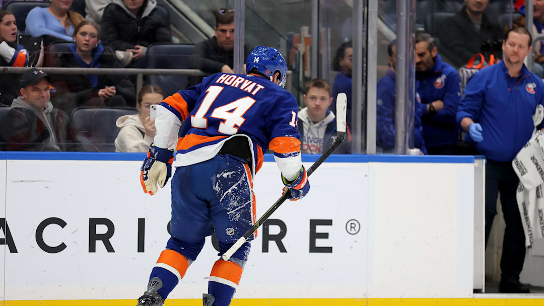 Dec 11, 2025; Elmont, New York, USA; New York Islanders center Bo Horvat (14) skates off the ice after a lower body injury during the second period against the Anaheim Ducks at UBS Arena. Mandatory Credit: Brad Penner-Imagn Images