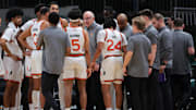 Dec 7, 2024; Coral Gables, Florida, USA; Miami Hurricanes head coach Jim Larranaga talks to his players during a timeline against the Clemson Tigers in the first half at Watsco Center. Mandatory Credit: Sam Navarro-Imagn Images