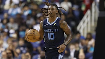 Oct 15, 2025; Greensboro, North Carolina, USA; Memphis Grizzlies guard Javon Small (10) dribbles the ball up the court during the second half against the Charlotte Hornets at First Horizon Coliseum. Mandatory Credit: Brian Westerholt-Imagn Images