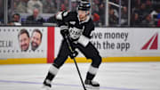 Apr 10, 2025; Los Angeles, California, USA; Los Angeles Kings right wing Adrian Kempe (9) controls the puck against the Anaheim Ducks during the second period at Crypto.com Arena. Mandatory Credit: Gary A. Vasquez-Imagn Images