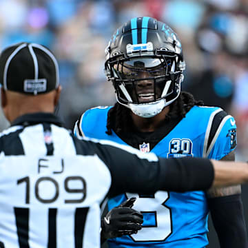 Oct 13, 2024; Charlotte, North Carolina, USA;  Carolina Panthers cornerback Jaycee Horn (8) is called for pass interferference on a pass intended for Atlanta Falcons wide receiver Darnell Mooney (1) in the first quarter at Bank of America Stadium. Mandatory Credit: Bob Donnan-Imagn Images