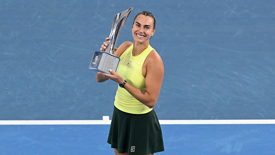 Aryna Sabalenka and Marta Kostyuk took separate pictures after the Brisbane International final.