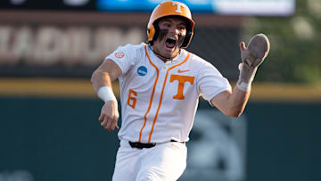 Tennessee's Gavin Kilen (6) leaps in celebration as he rounds the bases after Andrew Fischer (11) hits a home run at the NCAA college baseball Knoxville Regional final against Wake Forest on June 2, 2025, in Knoxville, Tenn.